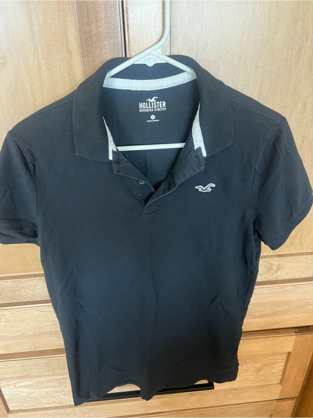 Hollister Men's Black Polo with White Logo Accent